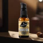 Beard oil bottle featuring sandalwood essential oil from Big Barber Delux, renowned barber shop in Australia for premium men's grooming products.